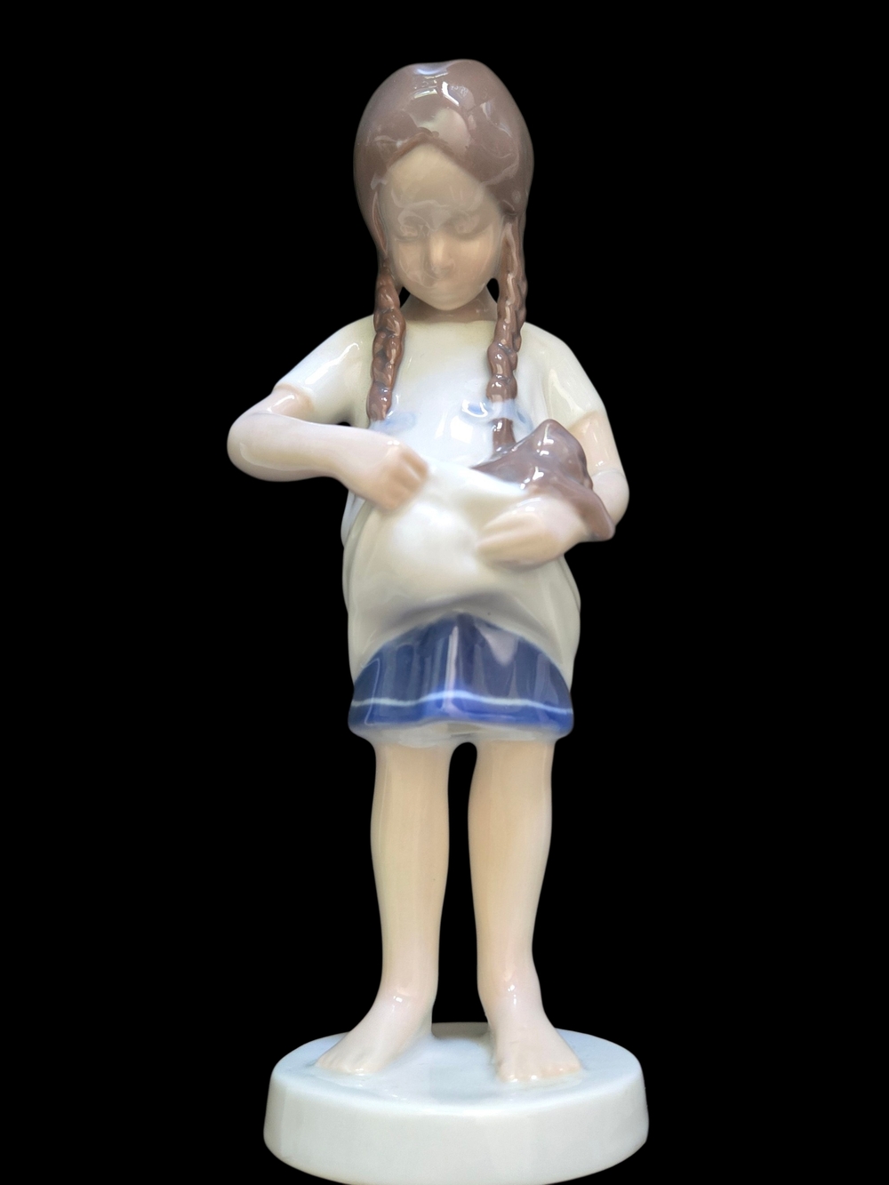 Vtg.Porcelain Girl Figurine in White, Blue and Brown Glaze Holding Her Kitten.